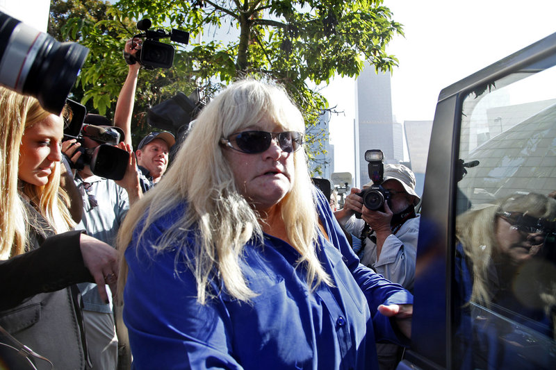 Debbie Rowe, Michael Jackson’s former wife and the mother of two of his children, leaves court in Los Angeles on Wednesday.