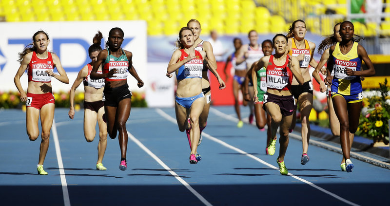 Mary Cain, far left, matches Kenya’s Nancy Jebet Langat, Russia’s Svetlana Podosenova, Morocco’s Siham Hilali and Sweden’s Abeba Aregawi in a 1,500-meter heat at the world athletics championship in Moscow.