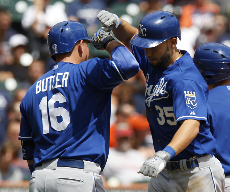 Kansas City’s Eric Hosmer celebrates with Billy Butler (16) after homering in the fourth inning of the first game of a doubleheader against Detroit. The Royals won both games, 2-1 and 3-0.