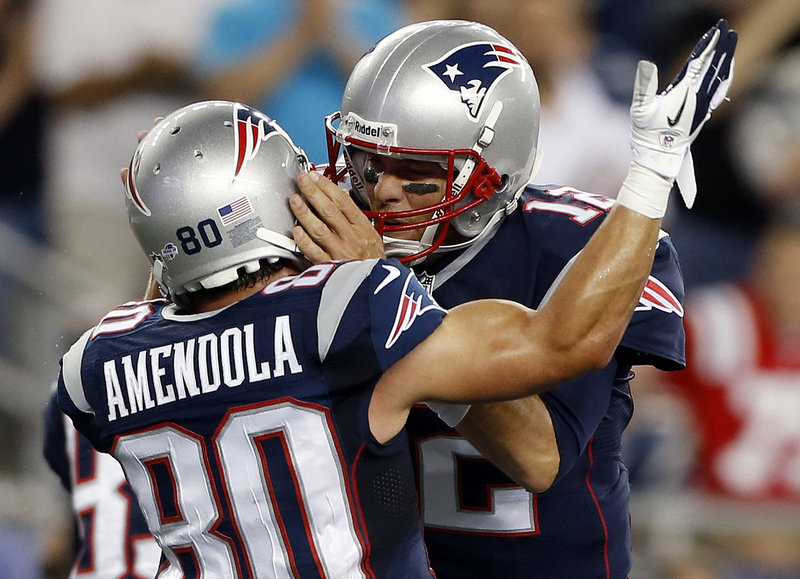 It’s the first of what the Patriots hope will be many touchdown celebrations between Tom Brady and new receiver Danny Amendola, as the two react after their first six-point collaboration ever Friday night during a 25-21 preseason victory over the Tampa Bay Buccaneers in Foxborough, Mass.