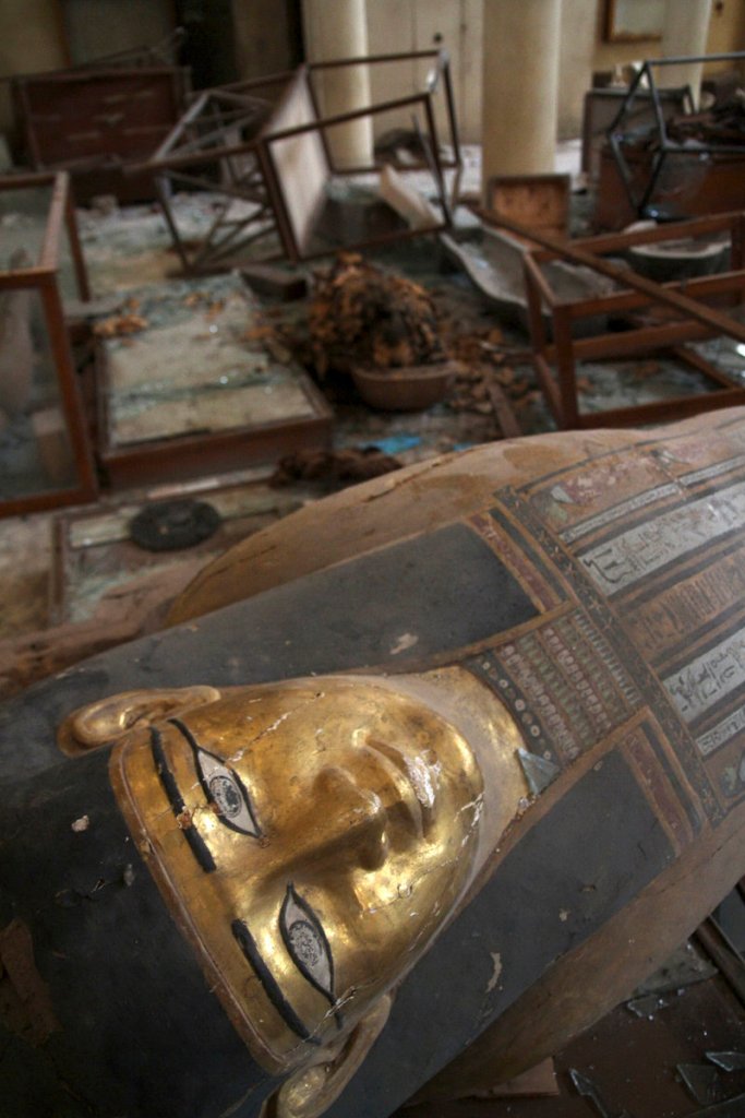 Damaged pharaonic objects lie on the floor of the Malawi Antiquities Museum after it was ransacked and looted late last week.
