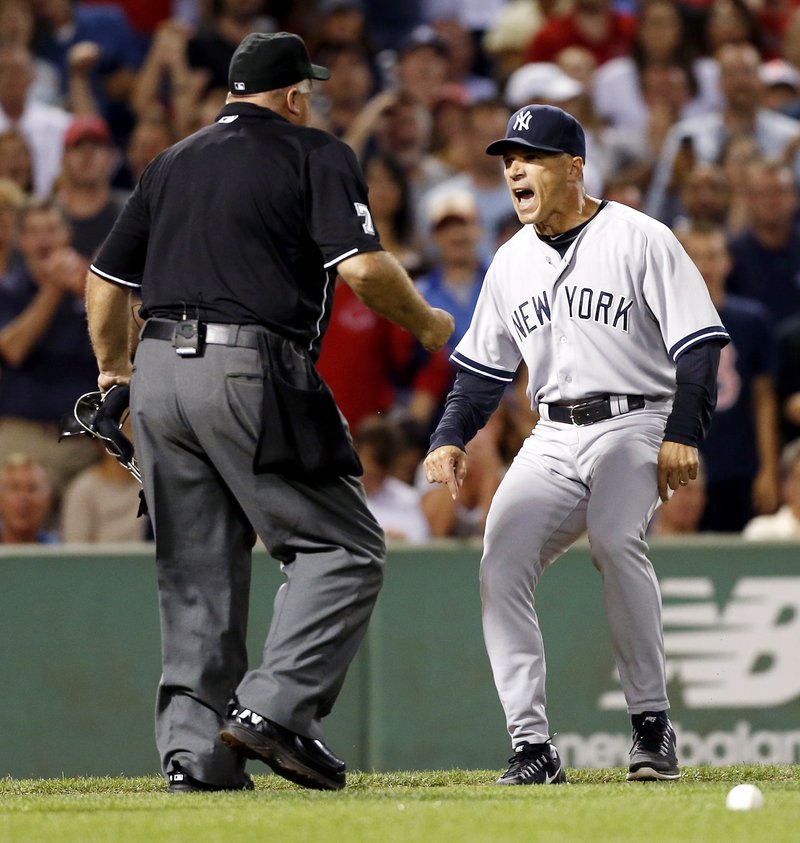Yankees Manager Joe Girardi argues with home plate umpire Brian O’Nora after Boston’s Ryan Dempster wasn’t ejected for hitting Alex Rodriguez with a pitch in the second inning. Instead, Girardi was thrown out.
