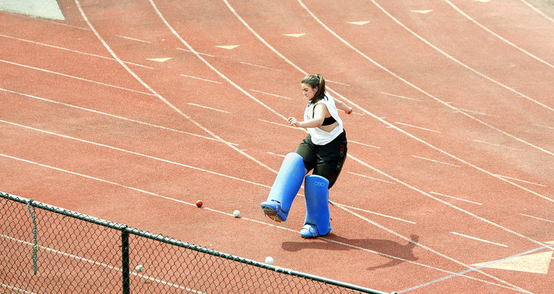 Gianna Gaudet, a field hockey goalie for Portland High School, works on her kick-clearing technique during the team’s first day of practice at Fitzpatrick Stadium on Monday.