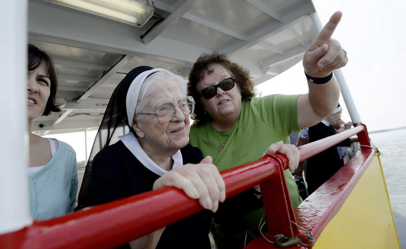 Sister Mary Louise Landry, who turned 102 on Sunday, enjoys a ride on a Casco Bay Lines Ferry on Tuesday, August 20, 2013. The ride was her birthday wish. She is with her caregivers from Frances Warde Convent in Portland. To the left is Angela Champagne and to the right is Mary Rich.