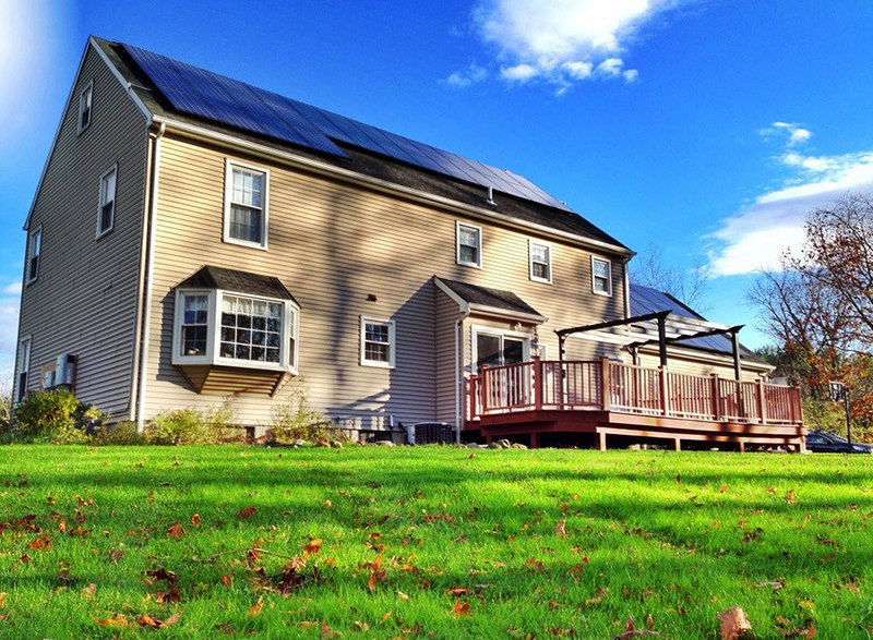 Ben Kunz’ house with solar panels installed on the roof in Cheshire, Conn.
