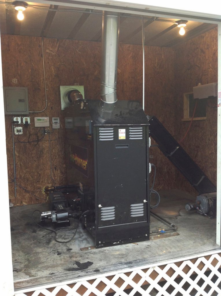 A wood pellet boiler in a HeatPod at the China Lake Conference Center is one of 11 Pelletco installations in Maine.