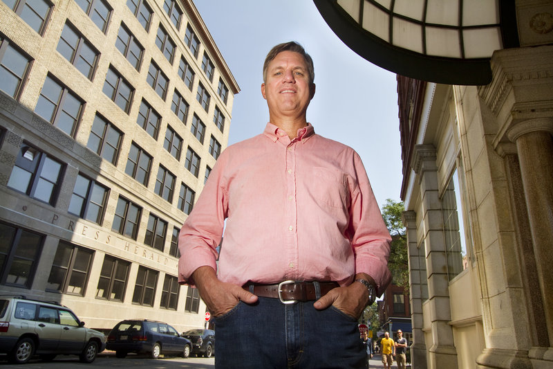 Hotel developer Jim Brady stands outside the former Portland Press Herald building, left, at Congress and Exchange streets last week. Brady is converting the site into a 110-room hotel, with plans to open in spring 2015.