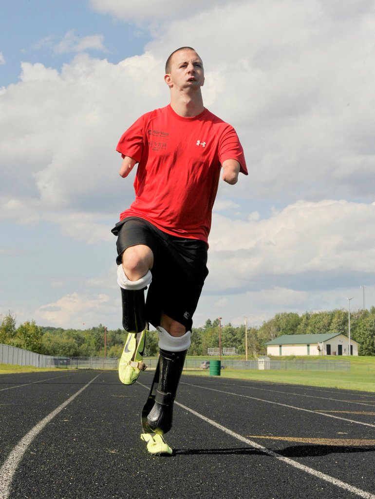Josh Kennison gets in a little running on the Oxford Hills High School track earlier this month.