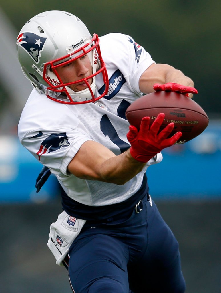 Wide receiver Julian Edelman snares a pass during the Patriots’ practice on Monday, as New England readies for its last preseason game, against the Giants on Thursday.