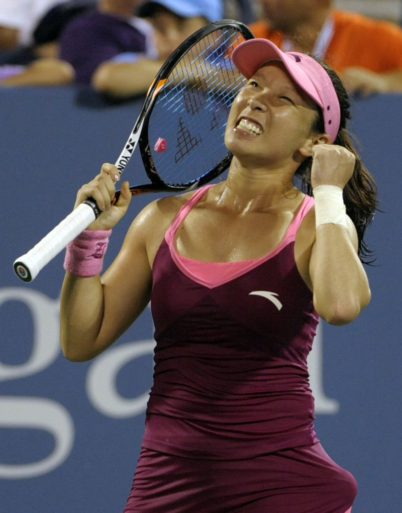 China’s Zheng Jie reacts after beating Venus Williams in three sets in second-round action of the U.S. Open at Flushing Meadows in New York.