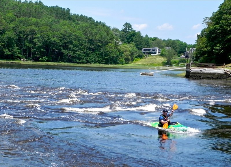 The Sheepscot Reversing Falls, a half-mile south of the Sheepscot River Bridge, are well-known among paddlers for the challenging waters created at mid-tide.