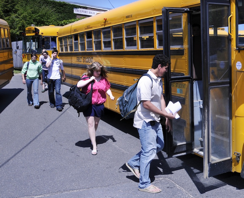 In this May 2008 file photo, Pownal students board the bus at Freeport High School to head back to Pownal. If Freeport schools were to break from the current partnership with Durham and Pownal, the stand-alone district would likely offer fewer academic options and have to close a $4 million budget gap in the first year, according to a study released Friday, Sept. 27, 2013.