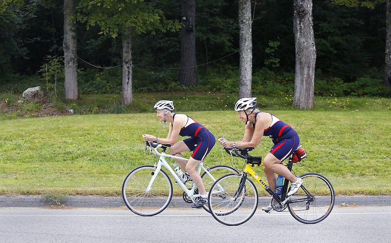 Beth Birch, left, and Ann Dillon, members of the U.S. triathlon team, train for the world sprint event in London. Photographed in Gray on September 7, 2013.