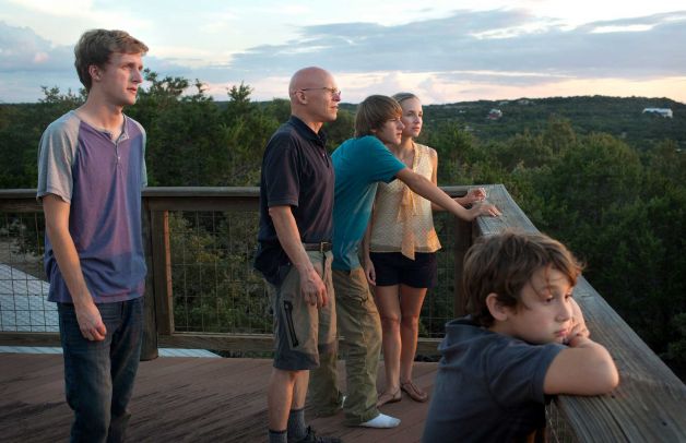 This Aug. 25, 2013 photo shows Steve Wolf, a self-employed stunt and special effects coordinator for film and television, who lives with his wife Maegan and their sons Clayton, 16, Paxton, 12, and Dashton, 8, in Austin, Texas. The Wolf family worries their income is too high to qualify for new tax credits implemented under the Affordable Care Act.