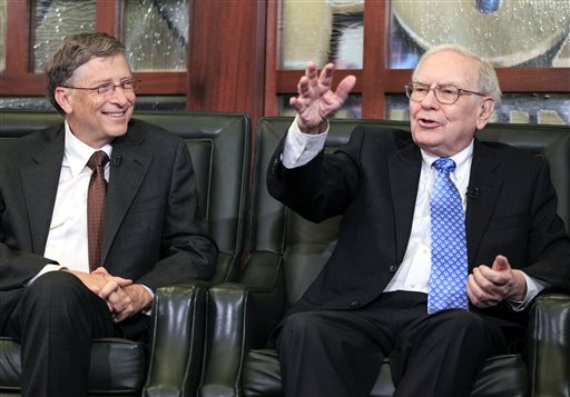 Richest of the rich: Microsoft co-founder Bill Gates and Berkshire Hathaway CEO and Chairman Warren Buffett appear at a Berkshire Hathaway shareholders meeting in May.