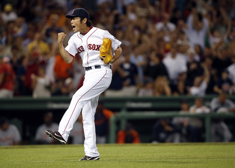 Boston closer Koji Uehara celebrates after defeating the Detroit Tigers 2-1 at Fenway Park Tuesday.