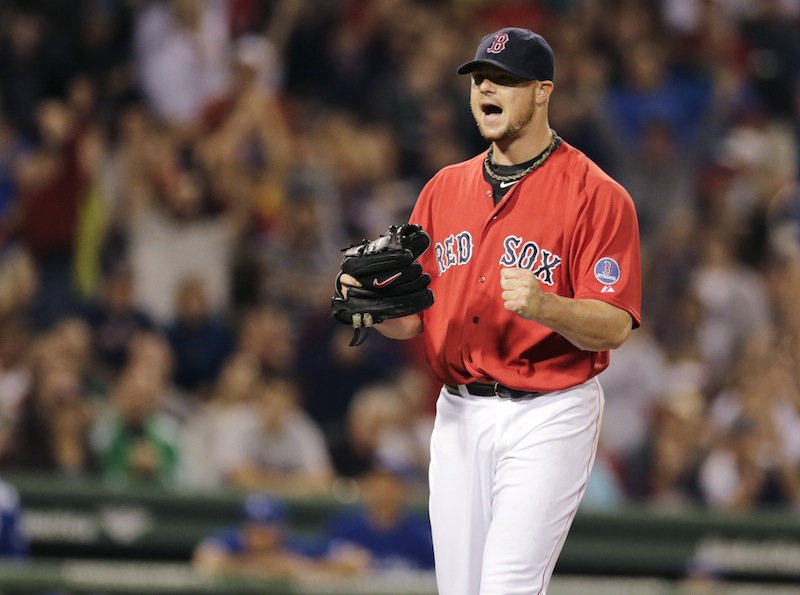 Jon Lester and the Red Sox were in a fist-pumping mood Friday as they clinched the American League East title.