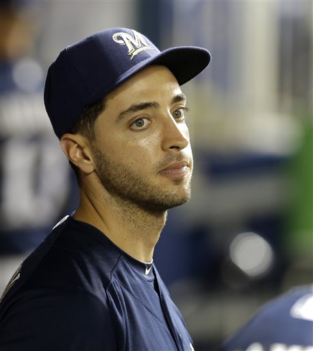 Milwaukee Brewers left fielder Ryan Braun is shown in the dugout during a baseball game against the Miami Marlins, in Miami. (AP Photo/Alan Diaz, File)
