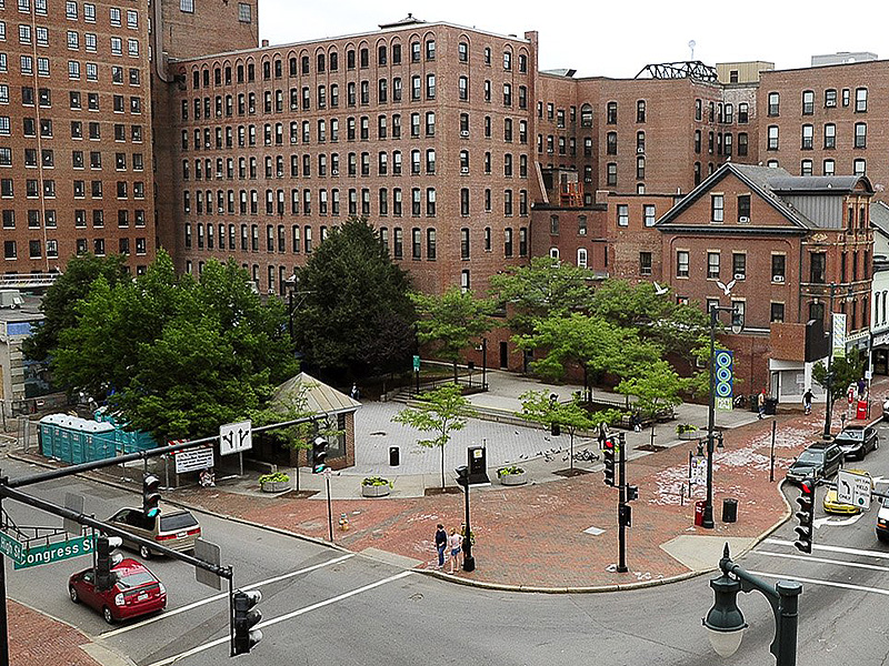 The space at Congress and High streets, which started out holding a wooden row house, has undergone many changes over the years. Walgreen’s replaced the row house, and Dunkin’ Donuts moved in later. In the 1980s, the space was converted into a plaza. Most recently, the city wanted to sell most of the half-acre park to a hotel owner but voters decided to protect it.