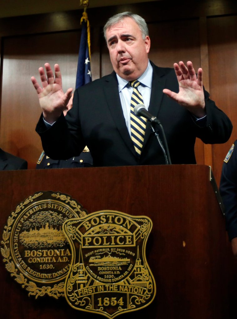 Boston Police Commissioner Edward Davis speaks during a news conference in Boston, Monday Sept. 23, 2013, announcing he is stepping down after seven years on the job. The 57-year-old Davis was appointed Boston's top cop by Mayor Thomas Menino in 2006. He previously served as the Lowell, Mass., police superintendent. (AP Photo/Elise Amendola)