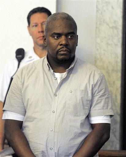 Ernest Wallace appears in district court in Attleboro, Mass. in this July 26, 2013, photo.