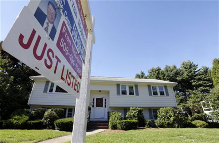 A house for sale in Walpole, Mass. U.S. Many economists say the housing recovery should withstand the recent mortgage rate increase. Mortgage rates are still quite low by historical standards.