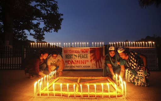 People in n Gauhati, India, light candles to mark the verdict after a judge announced death sentences Friday for four men convicted in the rape and murder of a student on a bus in New Delhi last year.