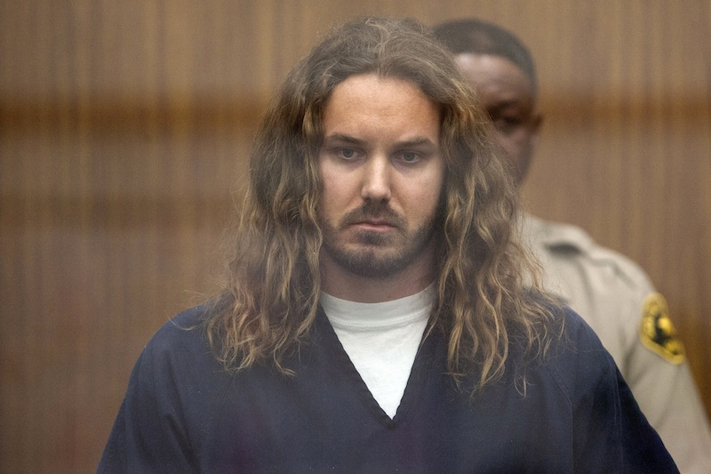 In this May 9, 2013 file photo, Tim Lambesis, 32, front man for the Christian-inspired heavy metal group As I Lay Dying, appears in Vista Superior Court in Vista, Calif. Lambesis is facing a court hearing Monday Sept. 16, 2013 to determine whether he will stand trial on charges he tried to hire someone to kill his estranged wife. (AP Photo/U-T San Diego, Bill Wechter, Pool, File)