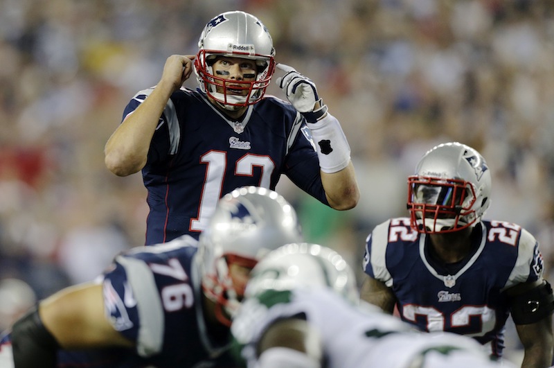 New England Patriots quarterback Tom Brady gestures at the line of scrimmage during the first quarter against the New York Jets in Foxborough, Mass., on Sept. 12. Tampa Bay can't close out games, losing twice already on last-second field goals. New England can't seem to find the magic on offense, yet has pulled out two close victories. When the Bucs visit the Patriots on Sunday, it will be a study in contrasts.