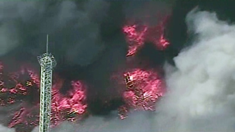 This image from aerial video shows a raging fire in Seaside Park, N.J. on Thursday, Sept. 12, 2013. The fire began in a frozen custard stand on the Seaside Park section of the boardwalk and quickly spread north into neighboring Seaside Heights. (AP Photo/ABC)