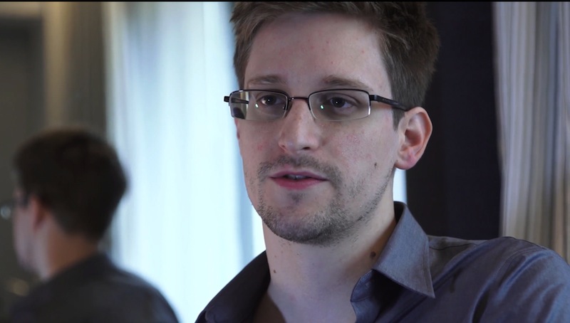 This photo provided by The Guardian Newspaper in London shows Edward Snowden, who worked as a contract employee at the National Security Agency, on Sunday, June 9, 2013, in Hong Kong. The National Security Agency, working with the British government, has secretly been unraveling encryption technology that billions of Internet users rely upon to keep their electronic messages and confidential data safe from prying eyes, according to published reports Thursday, Sept. 5, 2013, based on internal U.S. government documents. (AP Photo/The Guardian, Glenn Greenwald and Laura Poitras)