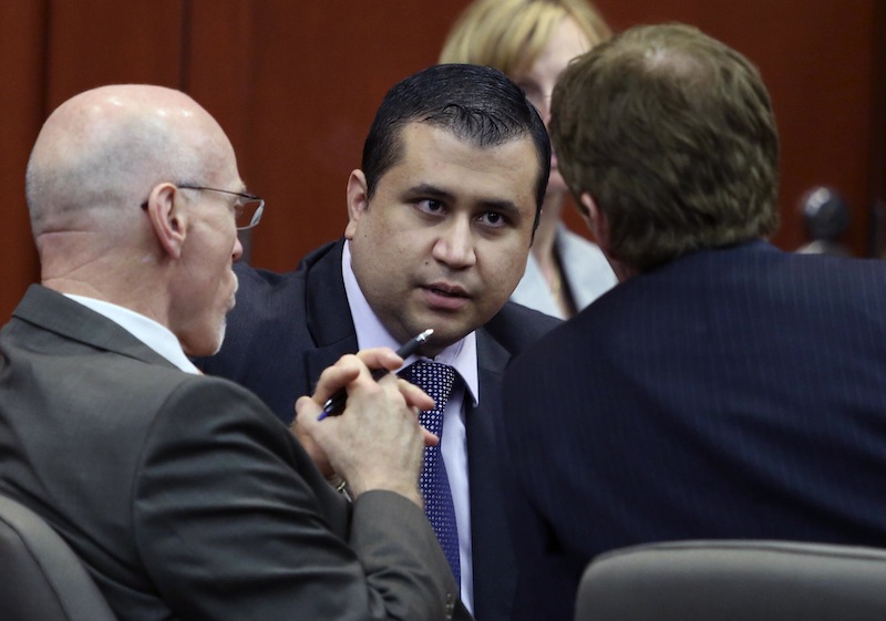 In this July 13, 2013, file photo, George Zimmerman, center, talks to his attorneys Don West, left, and Mark O'Mara during jury deliberations in his trial in Seminole circuit court in Sanford, Fla.