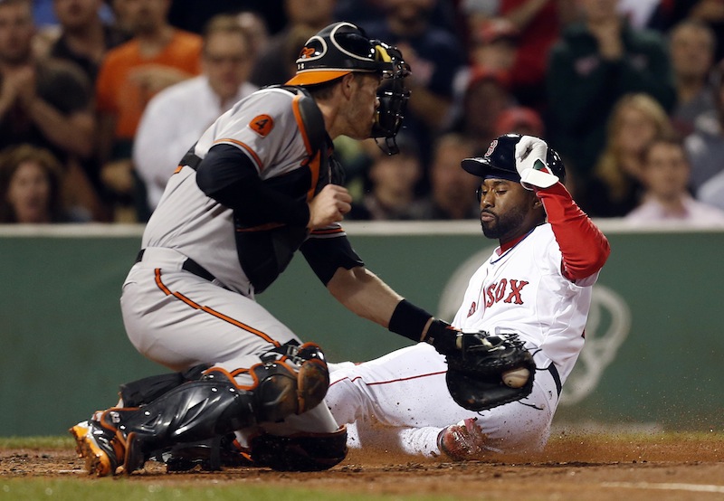 Orioles catcher Matt Wieters misses the tag as Boston's Jackie Bradley Jr. scores on a single by Dustin Pedroia in the second inning Thursday.