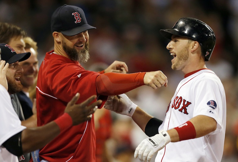 Stephen Drew, right, celebrates his two-run home run with Red Sox teammates including David Ross, center, Thursday.
