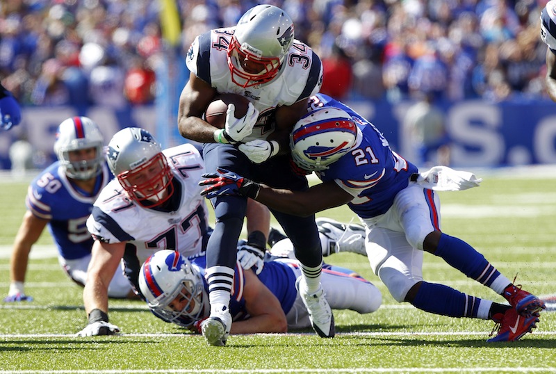 Buffalo Bills cornerback Leodis McKelvin (21) tackles New England Patriots' Shane Vereen (34) during the second half of an NFL football game on Sunday, Sept. 8, 2013, in Orchard Park. (AP Photo/Bill Wippert)