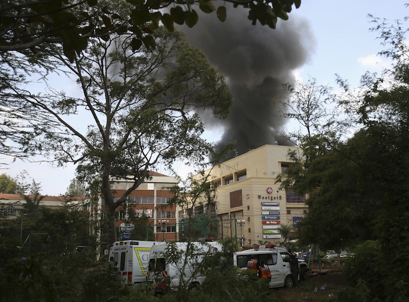 Smoke rises over Westgate shopping centre after an explosion in Nairobi, September 23, 2013. A day after a Twitter post linked Maine to Saturday's terrorist attack in a mall in Nairobi, Kenya, law enforcement officials refused to say whether they are investigating the possibility that radical Islamist groups are trying to recruit new members in the state. (REUTERS/Karel Prinsloo) :rel:d:bm:GF2E99N0YU901