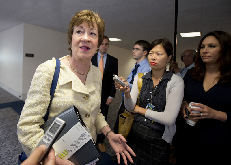 Senate Intelligence Committee member Sen. Susan Collins, R-Maine talks to reporters on Capitol Hill in Washington, Thursday, Sept. 5, 2013, as she arrives for a closed-door briefing on Syria. (AP Photo/Manuel Balce Ceneta)