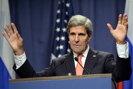 U.S. Secretary of State John Kerry addresses reporters in Geneva, Switzerland, Saturday after he and Russian Foreign Minister Sergei Lavrov announced their agreement on a framework for Syria to destroy all of its chemical weapons.