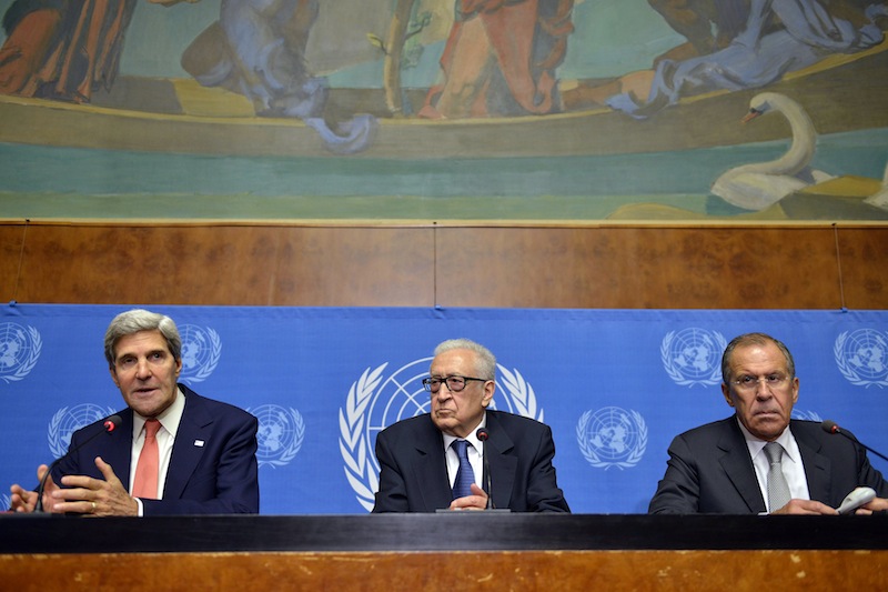 U.S. Secretary of State John Kerry, from left, UN Joint Special Representative for Syria Lakhdar Brahimi and Russian Foreign Minister Sergei Lavrov appear during a news conference following their meeting at the European headquarters of the United Nations in Geneva, Switzerland, Friday, Sept. 13, 2013. Kerry and Lavrov say the prospects for a resumption in the Syria peace process are riding on the outcome of their chemical weapons talks. (AP Photo/Keystone, Martial Trezzini)