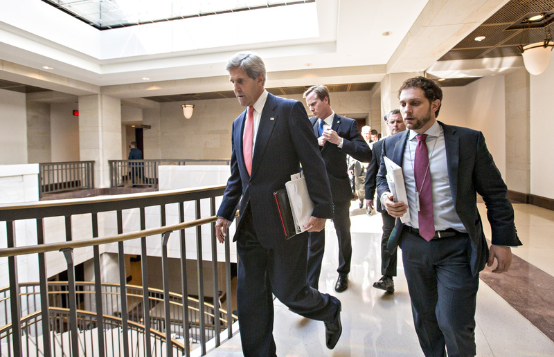 Secretary of State John Kerry arrives at the Capitol for a closed-door briefing on Syria with members of the Senate Foreign Relations Committee in Washington on Tuesday.