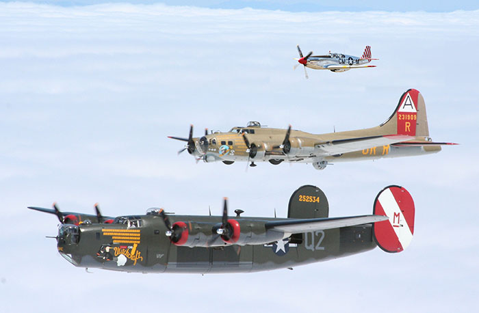 The Wings of Freedom Tour comprises a B-24 Liberator (front), a B-17 Flying Fortress and a P-51 Mustang (rear).