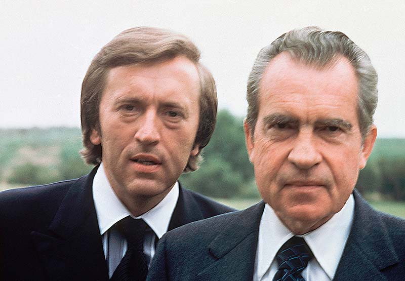 Former U.S. President Richard M. Nixon, right, with broadcaster David Frost in California in 1977. Frost died Saturday night at the age of 74, his family said in a statement on Sunday.