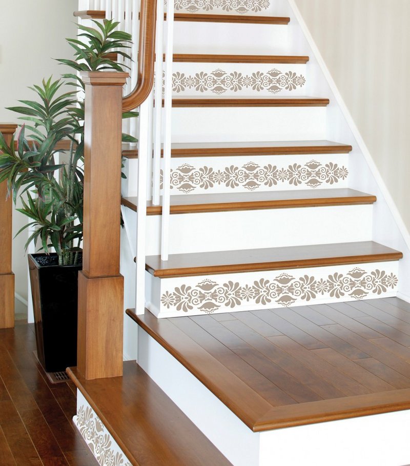 Decals, like these from WallPops on stairs, add personality to rented homes and can be easily removed.