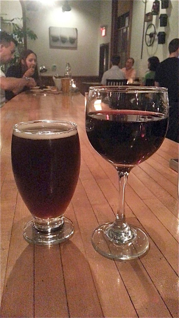 Pretty Things Quad beer for $9 and a glass of Gotham Project red blend for $6.