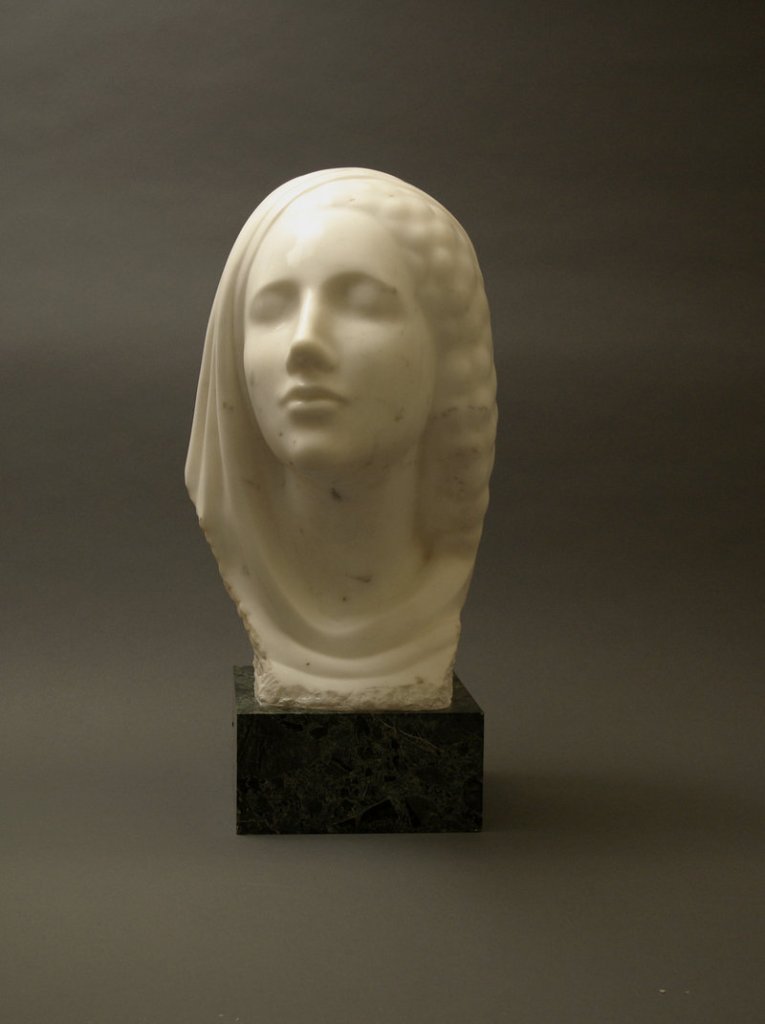 Elie Nadelman’s “Idealized Head,” c. 1910-15, marble, original onyx base.