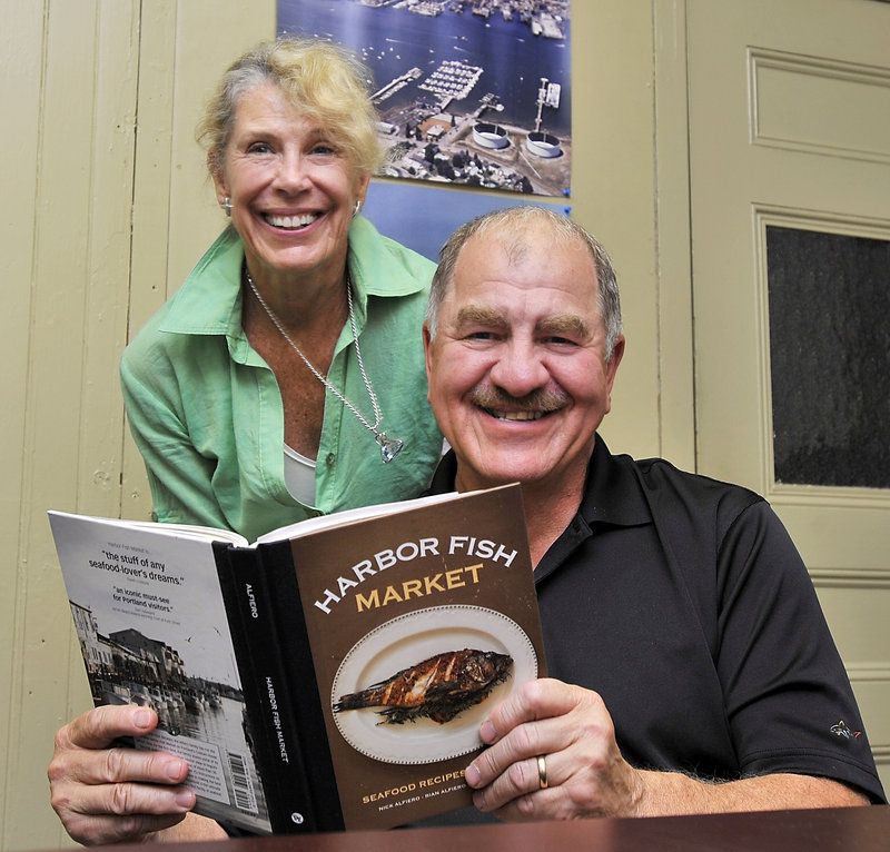 Kathleen and Nick Alfiero with the family's first cookbook.