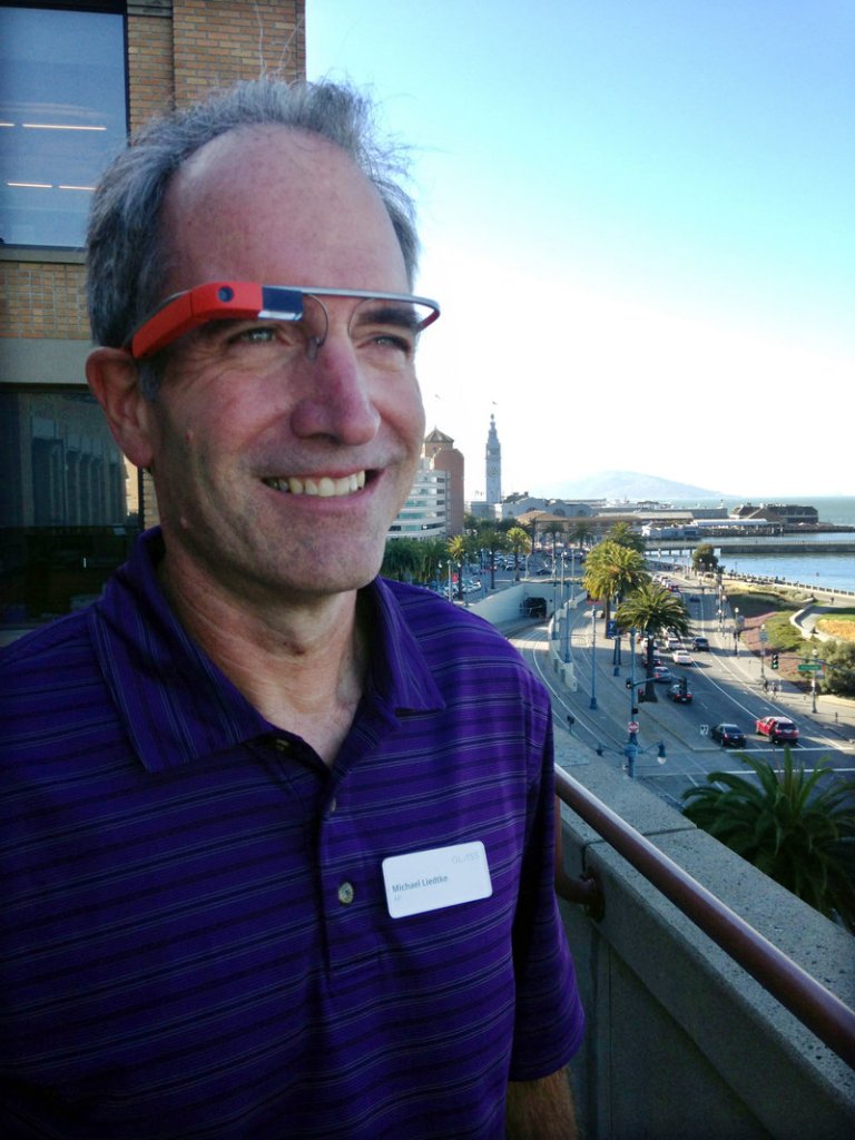 Reporter Michael Liedtke models Google Glass at a Google base camp in San Francisco.