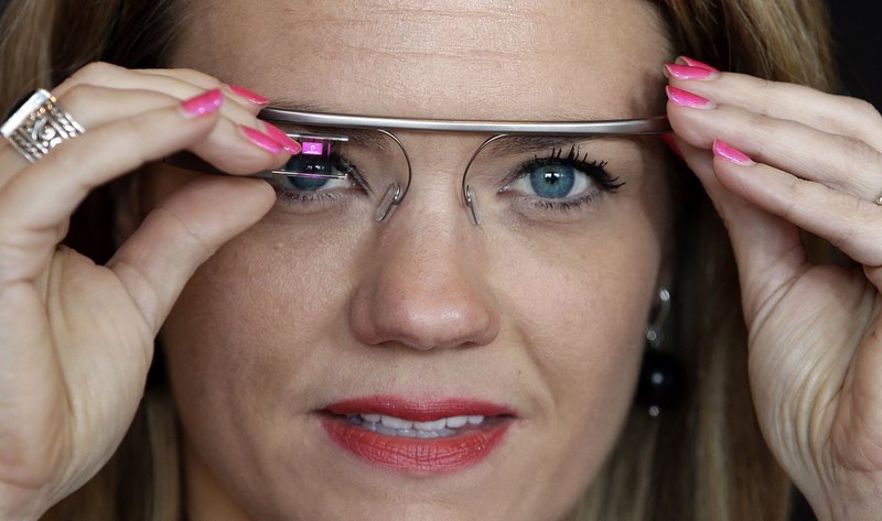 Sarah Hill, a Google Glass contest winner, tries out the device. “This is like having the Internet in your eye socket,” Hill said. “But it’s less intrusive than I thought it would be. I can totally see how this would still let you still be in the moment with the people around you.”