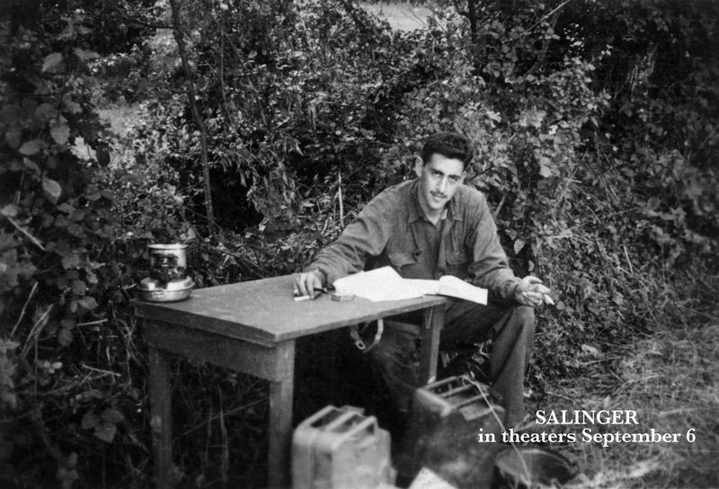 J.D. Salinger smiles for a picture while he works on “Catcher in the Rye” during World War II.