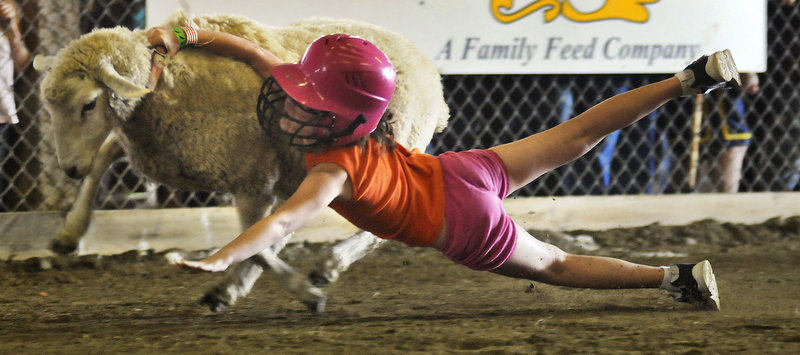 A sheep sheds its rider in a previous competition. This year’s Litchfield Fair Mutton Bustin’ contest takes place Sunday.